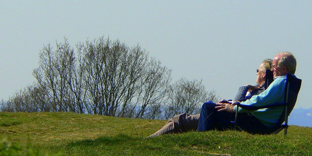 couple laying in grass